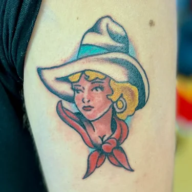 Cowgirl portrait tattoo in traditional style by Dustin Gormley, tattooing in Waikiki Hawaii